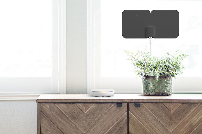 tablo_on_wood_table_with_antenna_in_window_black